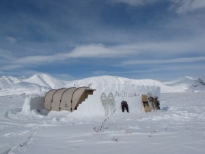 Snow-block walls protect our camp from the arctic winds
